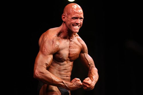 Trevor Forscutt competes in the Masters category during the Manitoba Bodybuilding Association Provincial Qualifier competition at Pantages Saturday night.  March 28, 2015 Ruth Bonneville / Winnipeg Free Press.