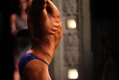 A Body builder competes in the Manitoba Bodybuilding Association Provincial Qualifier competition at Pantages Saturday night.  March 28, 2015 Ruth Bonneville / Winnipeg Free Press.