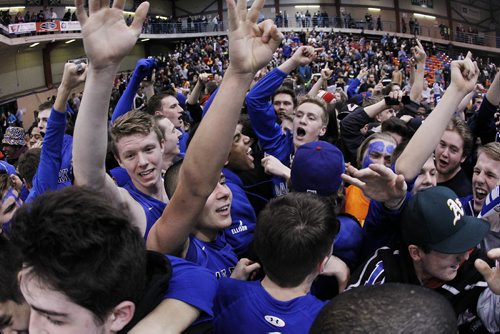 March 23, 2015 - 150323  -  Oak Park Raiders and fans celebrate after defeating the St Paul's Crusaders in the boys Manitoba High School AAAA Basketball Championship game at the U of Winnipeg Monday, March 23, 2015. John Woods / Winnipeg Free Press