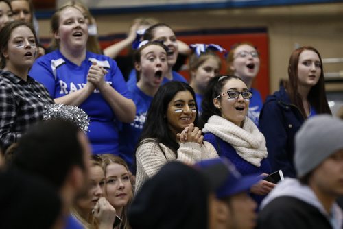 March 23, 2015 - 150323  -  Oak Park Raiders and fans celebrate after defeating the St Paul's Crusaders in the boys Manitoba High School AAAA Basketball Championship game at the U of Winnipeg Monday, March 23, 2015. John Woods / Winnipeg Free Press