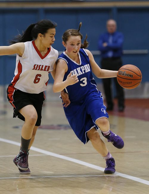 March 23, 2015 - 150323  -  Oak Park Raiders in the girls Manitoba High School AAAA Basketball Championship game at the U of Winnipeg Monday, March 23, 2015. John Woods / Winnipeg Free Press