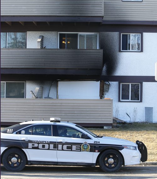 Winnipeg Police at 72 Quail Ridge Road Tuesday morning, the scene of a early morning fire.  Wayne Glowacki/Winnipeg Free Press March 31  2015