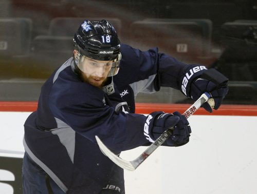 Winnipeg Jets Bryan Little works hard in the morning skate at the MTS Centre Tuesday morning- The Jets will play against the New York Rangers tonight-See Ed Tait story- Mar 31, 2015   (JOE BRYKSA / WINNIPEG FREE PRESS)
