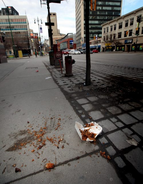 Downtown trash on sidwalks...... See story. March 31, 2015 - (Phil Hossack / Winnipeg Free Press)