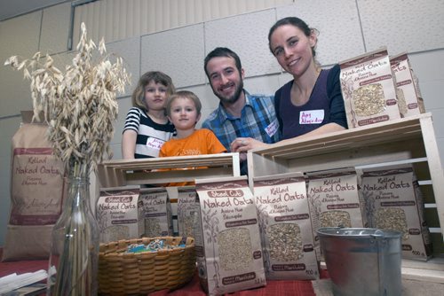 Food Matters Manitoba is hosted a speed networking event to try and match up local farmers and food processors who have products  that they want to sell locally with local retailers and restaurant operators who want to either feature more  locally-produced food in their stores or restaurants.- Here Amy Nikkel and her husband Donald and their children Eli and Alexis( Girl) from Adagio Acres from near Lundar, Manitoba who produce Naked Oats which is sold in some stores and served in local restaurants- See Murray McNeil story- Apr 01, 2015   (JOE BRYKSA / WINNIPEG FREE PRESS)