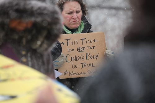 Ashlyn Haglund holds a sign at memorial as people  gather  at The Forks in Winnipeg and other Canadian cities Thursday, to mourn the despicable death of Cindy Gladue and the atrocious way she was treated by the criminal justice system. The 36-year-old woman was killed in June 2011 in Edmonton and the man responsible for her death -- 46-year-old Brad Barton -- was found by a jury to be not guilty of first-degree murder and manslaughter.   April 2, 2015 Ruth Bonneville / Winnipeg Free Press.