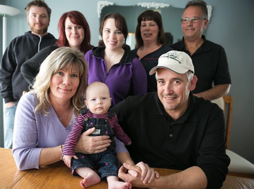 MP Shelly Glover with her six-month-old grandchild Mila and husband Bruce celebrated with some of her large family at her home Friday. (back left to right) son-in-law Matt, daughters Jamie-Lee and Randi, sister Tracy and brother-in-law Rick. Glover announced April 3rd that she would not seek reelection as MP for St. Boniface in the next federal election.   150403 - Friday, April 03, 2015 - (Melissa Tait / Winnipeg Free Press)