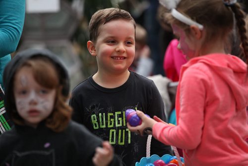Five-year- old Jayden Borges is all smiles he waits in line to exchange his  coloured eggs that he found during his hunt for chocolate and candies at Shemerdine's first Easter Egg Hunt  event Saturday morning.   Standup photo.    April 4, 2015 Ruth Bonneville / Winnipeg Free Press.