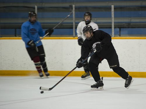 150331 Winnipeg - DAVID LIPNOWSKI / WINNIPEG FREE PRESS  AAA Bantam Winnipeg Warriors defenceman Jett Woo at practice Tuesday March 31, 2015 in preparation for the upcoming Western Canada AAA Bantam Championships, held in Winnipeg this weekend. The team are the 2014-15 Manitoba provincial champions.  - Melissa Martin story