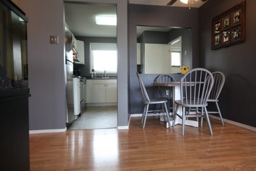 Resale home at 38 Bourkewood in Silver Heights realtor Renee Dewar. Kitchen and dining room open to living space.  April 7, 2015 Ruth Bonneville / Winnipeg Free Press.