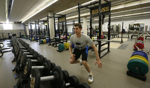Bison basketball player Keenan Benarroch works out in the High Performance Training Centre in the Active Living Centre on the University of Manitoba Fort Garry Campus. Geoff Kirbyson  story.Wayne Glowacki/Winnipeg Free Press April 7 2015