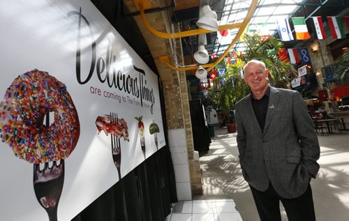 Paul Jordan, CEO of The Forks Renewal Corporation is leading a reinvention of the food hall that will welcome and make getting involved easier for young chefs. He is standing by one of several food outlet locations in the centre court that will be part of the new plan. Gord Sinclair story.Wayne Glowacki/Winnipeg Free Press April 8 2015