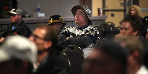 Winnipeg Blue Bomber A pair of the hundred or so "fans" showed their colors at the team's annual "Fan Forum" at Investor's Group Stadium Wednesday evening. See Paul Wiecek's story. April 8, 2015 - (Phil Hossack / Winnipeg Free Press)