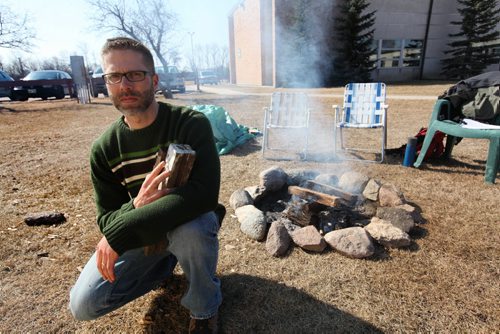 Faith page. Steve Heinrichs, staff person of Mennonite Church Canada, keeps vigil from Easter to Earth Day to bring attention to climate change issues. April 9, 2015 Ruth Bonneville / Winnipeg Free Press.