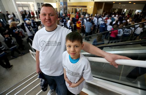 Matt Pilbeam and his son, Dawon, 8, for Bill Redekop Streeter at Winnipeg Jets game, Saturday, April 11, 2015. (TREVOR HAGAN/WINNIPEG FREE PRESS)