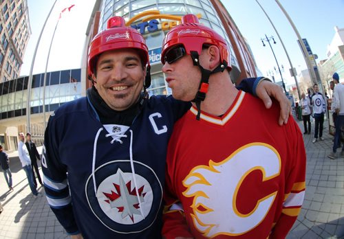 Devon Potvin and Steve Welzbacher, fans for Streeter at Winnipeg Jets game, Saturday, April 11, 2015. (TREVOR HAGAN/WINNIPEG FREE PRESS)