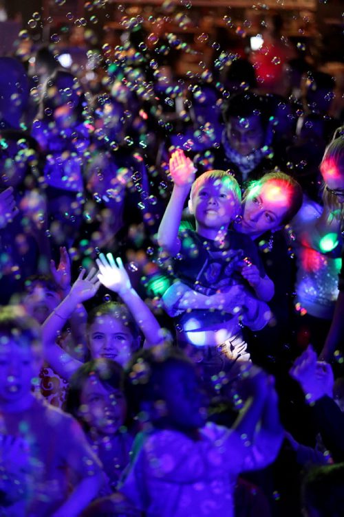 Sarah Johnson and son Erik Cheater, 6, at DJ Mama Cutsworth's Family Dance Party at Good Will Social Club for Dave Sanderson 49.8 piece, Sunday, April 12, 2015. (TREVOR HAGAN/WINNIPEG FREE PRESS)