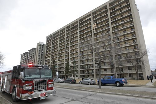 April 12, 2015 - 150412  -  Firefighters attend a fire on an apartment balcony at 429 Westwood Sunday, April 12, 2015. John Woods / Winnipeg Free Press