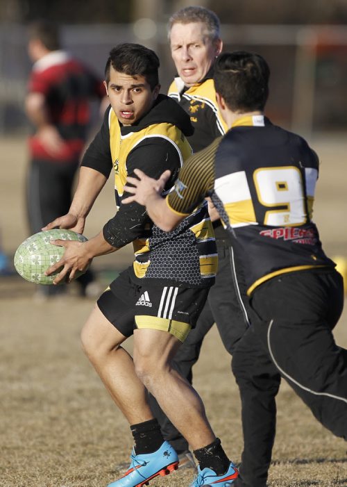 April 13, 2015 - 150413  -  Walter Moreno, scrumhalf, and the Winnipeg Wasps practise at River Heights Community Centre Monday, April 13, 2015. The team is practising for a rugby tour of  Ireland at the end of April. John Woods / Winnipeg Free Press