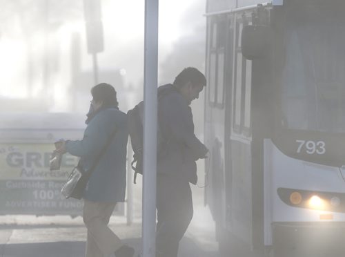 Dust is in the air along Portage Tuesday morning. Wayne Glowacki/Winnipeg Free Press April 14 2015