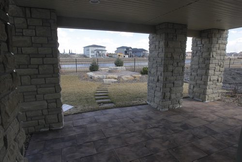 NEW HOMES  - 136 Lake Bend Road. Basement walkout. BORIS MINKEVICH/WINNIPEG FREE PRESS APRIL 13, 2015