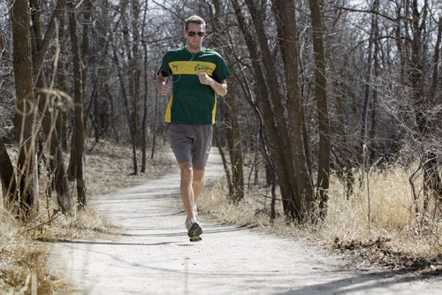 David Richert, a race car driver driving in Europe's Formula Renault 2.0 series keeps fit by running in nearby park Bois-des-esprits.   Ruth Bonneville / Winnipeg Free Press April 14, 2015