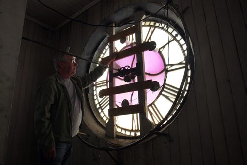 Morden, Manitoba- Refurbished heritage building at 352 Stephen Street in Morden, Manitoba including old clock that is again functioning. Bill Potter, Pembina Arts Council board chairman inside upper tower with100 year old clock-One of four displays that are seen from outside -See Bill Redekop story- Apr 14, 2015   (JOE BRYKSA / WINNIPEG FREE PRESS)