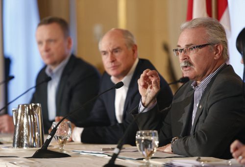 From right, Agriculture Minister Gerry Ritz, Ian White pres. and CEO CWB and Karl Gerrand, pres. and CEO G3 at the news conference in Winnipeg Wednesday to give an update on the commercialization process for CWB.  Martin Cash story Wayne Glowacki/Winnipeg Free Press April 15 2015