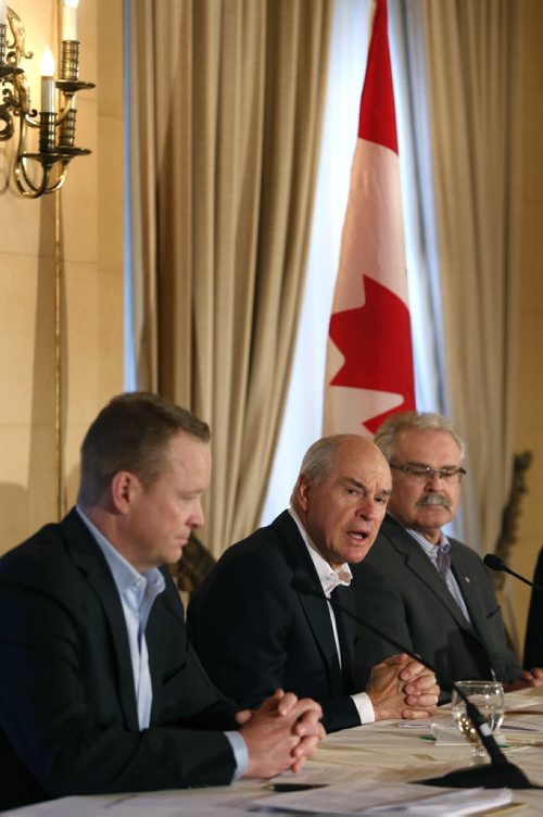 From right, Agriculture Minister Gerry Ritz, Ian White pres. and CEO, CWB and Karl Gerrand, pres. and CEO G3 at the news conference in Winnipeg Wednesday to give an update on the commercialization process for CWB.  Martin Cash story Wayne Glowacki/Winnipeg Free Press April 15 2015