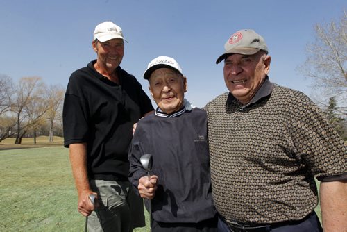 LOCAL FITNESS - A fellow named Frank Yahiro at the Rossmere Golf Course driving range. He's 91, has had 7 hole-in-ones in his golf career. Here he is flanked by his friends John Taylor and Walter Galagan. (left and right) BORIS MINKEVICH/WINNIPEG FREE PRESS APRIL 15, 2015