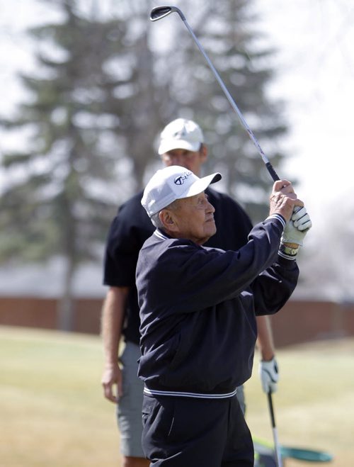LOCAL FITNESS - A fellow named Frank Yahiro at the Rossmere Golf Course driving range. He's 91, has had 7 hole-in-ones in his golf career. BORIS MINKEVICH/WINNIPEG FREE PRESS APRIL 15, 2015
