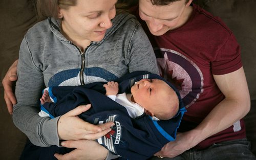 Justine and Jeremy Welwood with their two-day-old baby boy Jett. He's not just named after the Winnipeg Jets, the parents both liked the name - for a boy or a girl. Born April 13th, 2015, just a few days before the Winnipeg Jets start their first playoff run since 1996. 150415 - Wednesday, April 15, 2015 - (Melissa Tait / Winnipeg Free Press)