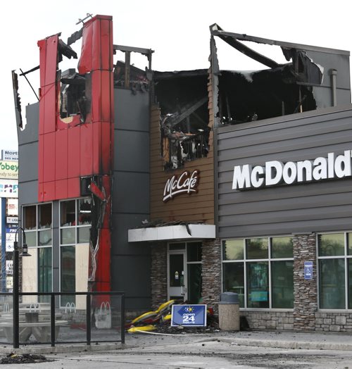 The fire damaged McDonald's restaurant Friday morning on the Northdale Shopping Centre lot at 963 Henderson Hwy. after a fire Thursday.  Wayne Glowacki/Winnipeg Free Press April 16  2015