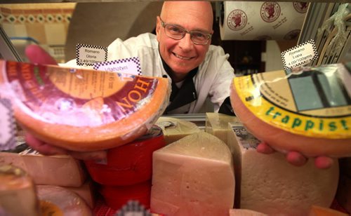 Piazza De Nardi's TOM De NARDI with some of the approximately 400 different types of cheese they sell. For a story on how milk production is at record levels in Manitoba in the wake of a growing demand for cheese, butter and other locally produced or natural dairy products. Murray McNeill's story. April 16, 2015 - (Phil Hossack / Winnipeg Free Press)
