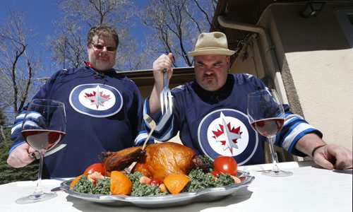 At right, Big Daddy Tazz  and Doug Speirs  "cook up some duck"  for the Winnipeg Jets Stanley Cup series against the Anaheim Ducks.  For Doug Speirs video/column Wayne Glowacki/Winnipeg Free Press April 17  2015