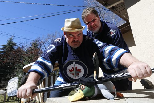 At left, Big Daddy Tazz and Doug Speirs "tenderize before they cook up some duck"  for Winnipeg Jets Stanley Cup series against the Anaheim Ducks.  For Doug Speirs video/column Wayne Glowacki/Winnipeg Free Press April 17  2015