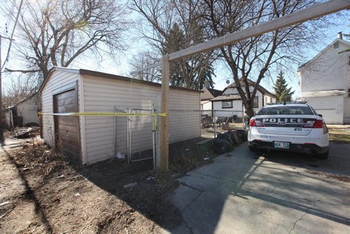 Police tape surrounds the back yard of  719 Flora Ave. Saturday morning just behind 740 Selkirk Ave. where a fight broke out Friday night. Possible homicide occurred at one of these two scenes but not confirmed and no further information to report at this time.    See story.   Ruth Bonneville / Winnipeg Free Press April 16, 2015