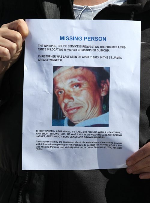 Bobbi Starr, sister to Christopher Guimond who has been missing since April 7th, holds a police notice regarding his disappearance.   See story.   Ruth Bonneville / Winnipeg Free Press April 18, 2015