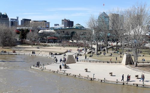 People out on the River Walk along the Assiniboine River at The Forks, Saturday, April 18, 2015. (TREVOR HAGAN/WINNIPEG FREE PRESS)
