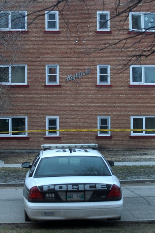 Winnipeg Police have taped off a large area surrounding the Highfield Apartment on Highfield St in Norwood Flats Monday morning-Breaking News- Apr 20, 2015   (JOE BRYKSA / WINNIPEG FREE PRESS)