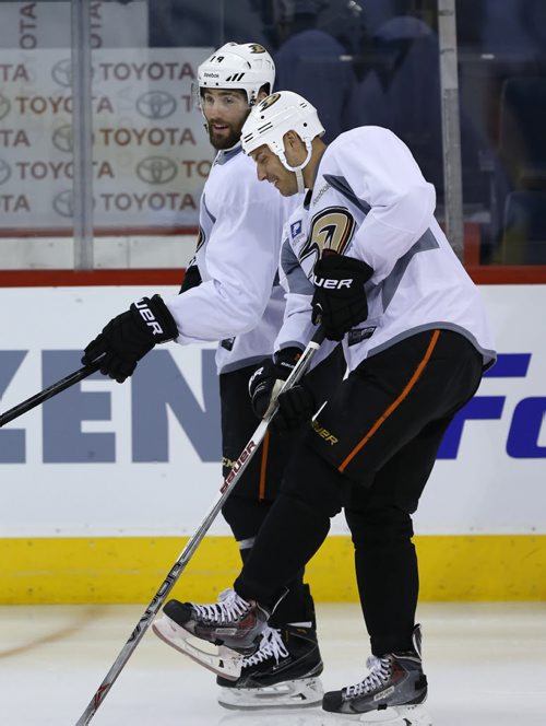 Anaheim Ducks players Ryan Getzlaf at right and Patrick Maroon at the team practice in the MTS Centre Monday morning. Winnipeg Jets  face the Anaheim Ducks Monday night in Game 3 of their Western Conference First Round series.Wayne Glowacki/Winnipeg Free Press April 20 2015