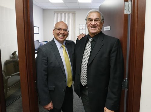 At right, Paul Chartrand, a 71 year old retired law professor whos being called to the bar, to practice law. He is with Norman Boudreau at the doorway to Norman's office at  Boudreau Law.   Alex Paul story Wayne Glowacki/Winnipeg Free Press April 20 2015