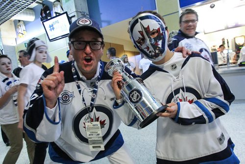 Ken Hamin (left) and Keaton Hamin, 9,  prior the to third game of the Stanley Cup playoff series between the Winnipeg Jets and the Anaheim Ducks at MTS Centre in Winnipeg, Manitoba. 150420 - Monday, April 20, 2015 -  (MIKE DEAL / WINNIPEG FREE PRESS)