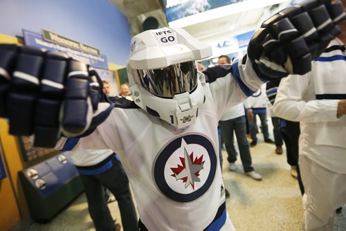 Jett celebrates prior to NHL game 3 playoff action in Winnipeg on Monday, April 20, 2015. John Woods/Winnipeg Free Press