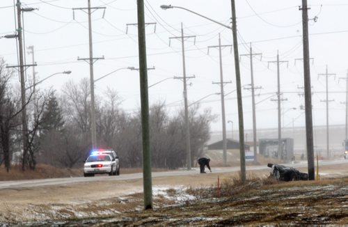 Wilkes is closed between Community Road and Charleswood Road as Winnipeg Police investigate crash that occurred this morning -Breaking News- Apr 21, 2015   (JOE BRYKSA / WINNIPEG FREE PRESS)