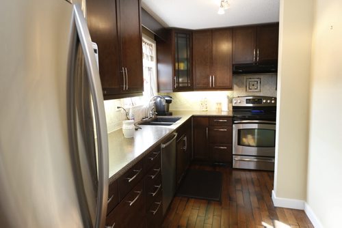 Homes. 35 Ladywood Drive in Silver Heights and the realtor is Jeff Stern. Fridge at left in the kitchen area. Todd Lewys story Wayne Glowacki/Winnipeg Free Press April 21 2015