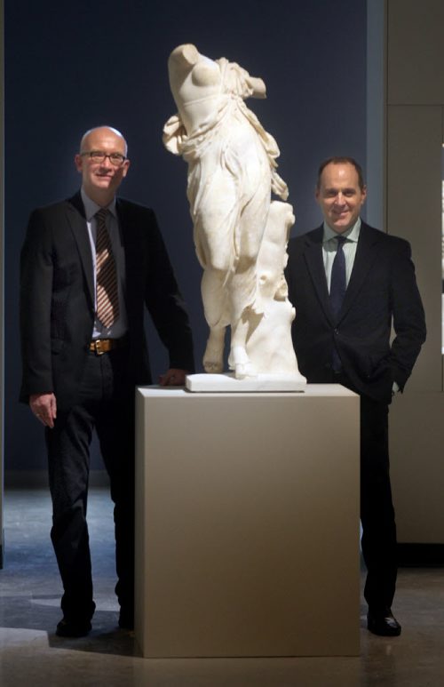 Andreas Scholl, director of Antikensammlung der Staatlichen Museen zu Berlin (left) and WAG CEO Stephen Borys pose framing a sculpture of "the Berlin Dancer". See Kevin Prokosh story. April 21, 2015 - (Phil Hossack / Winnipeg Free Press)
