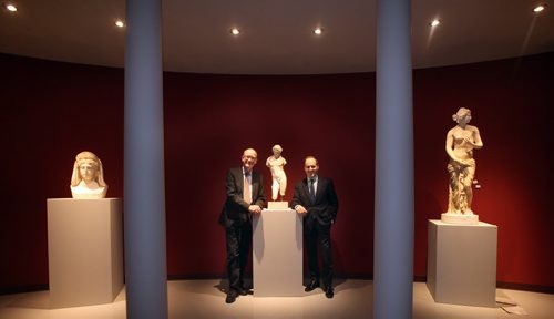 Andreas Scholl, director of Antikensammlung der Staatlichen Museen zu Berlin (left) and WAG CEO Stephen Borys pose framing a sculpture of Dionysos. A bust of Demeter is left of them and Aphrodite on the right.. See Kevin Prokosh story. April 21, 2015 - (Phil Hossack / Winnipeg Free Press)
