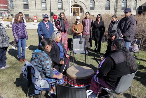 LOCAL -  EARTH DAY - Sacred ceremony - Keewatin Ochichak Singers (an all female drum group) conduct a drum ceremony on the front lawn of the University of Winnipeg to honour Mother Earth. BORIS MINKEVICH/WINNIPEG FREE PRESS APRIL 22, 2015