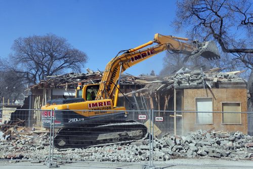 545 Sargent Avenue gets demolished this afternoon. BORIS MINKEVICH/WINNIPEG FREE PRESS APRIL 22, 2015